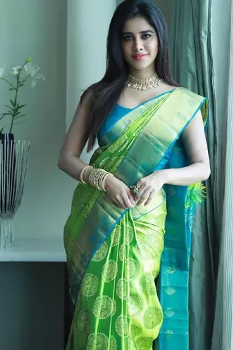 Green turuoise silk blend banarasi saree with unstitched blouse piece