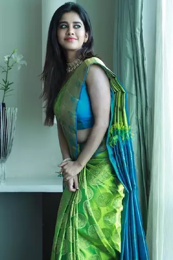 Green turuoise silk blend banarasi saree with unstitched blouse piece