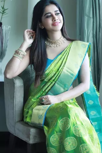 Green turuoise silk blend banarasi saree with unstitched blouse piece