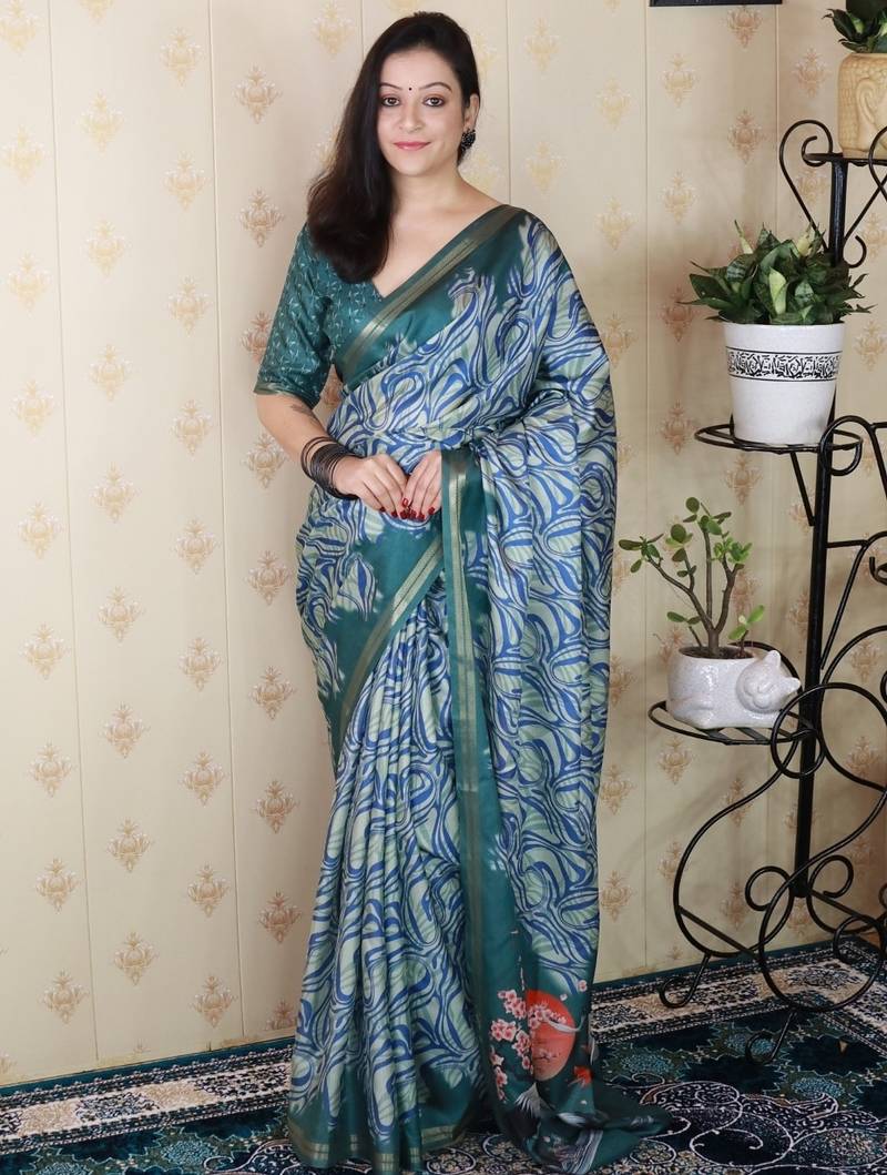 Teal tussar silk printed zari border saree with matching blouse piece