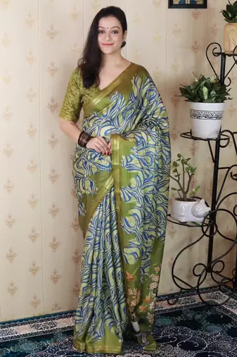 Green tussar silk printed zari border saree with matching blouse piece