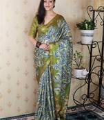 Green tussar silk printed zari border saree with matching blouse piece