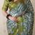 Green tussar silk printed zari border saree with matching blouse piece