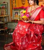 Red silk blend banarasi saree with unstitched blouse piece