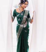 Green silk blend banarasi saree with unstitched blouse piece