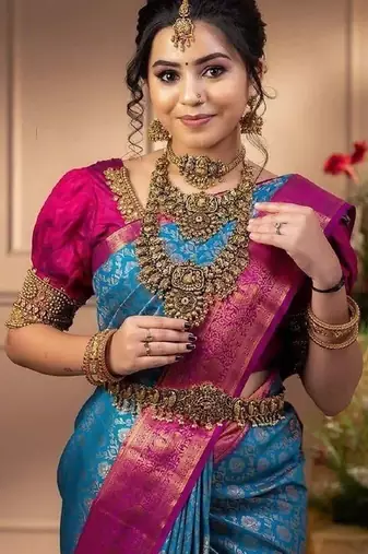 Turquoise pink silk blend banarasi saree with unstitched blouse piece