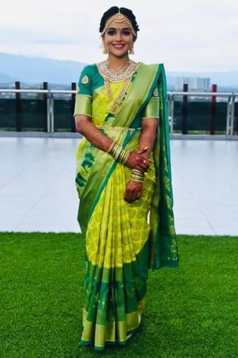 Parrot green soft silk blend banarasi jacuard work designer party wear saree with unstitched blouse piece