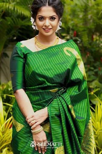 Green soft silk blend banarasi jacuard work designer party wear saree with unstitched blouse piece