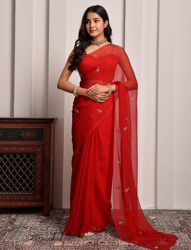 Red hand embroidered chiffon saree