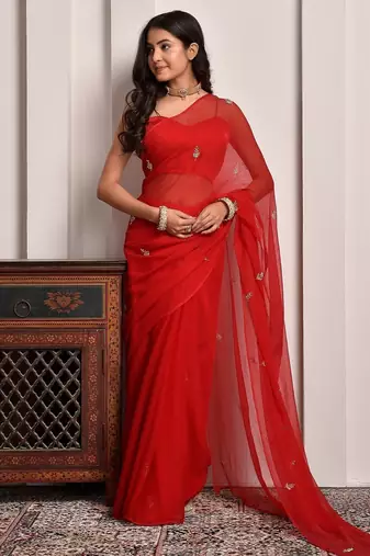 Red hand embroidered chiffon saree