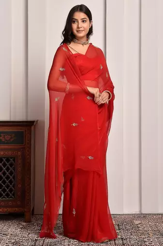 Red hand embroidered chiffon saree
