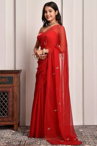 Red hand embroidered chiffon saree