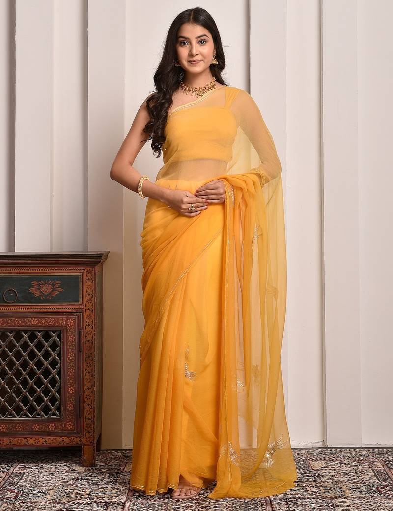 Yellow shaded hand embellished chiffon saree
