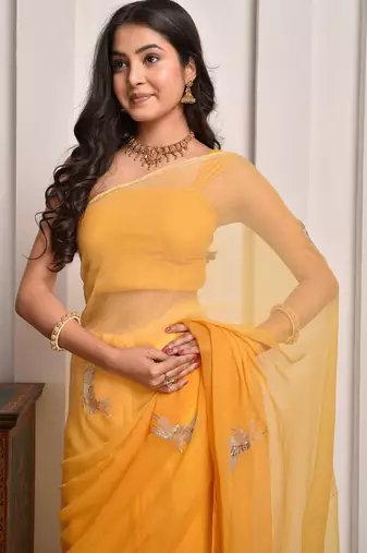 Yellow shaded hand embellished chiffon saree