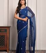 Blue hand embellished mukaish work chiffon saree