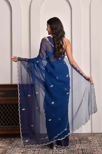 Blue hand embellished mukaish work chiffon saree