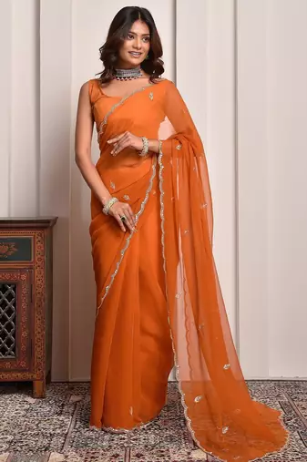 Rust hand embellished mukaish work chiffon saree