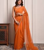 Rust hand embellished mukaish work chiffon saree