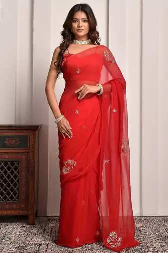 Red shaded hand embellished chiffon saree