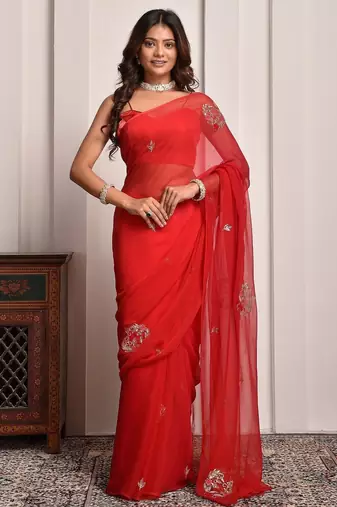 Red shaded hand embellished chiffon saree