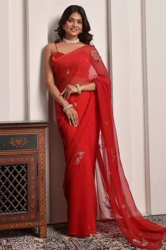 Red shaded hand embellished chiffon saree