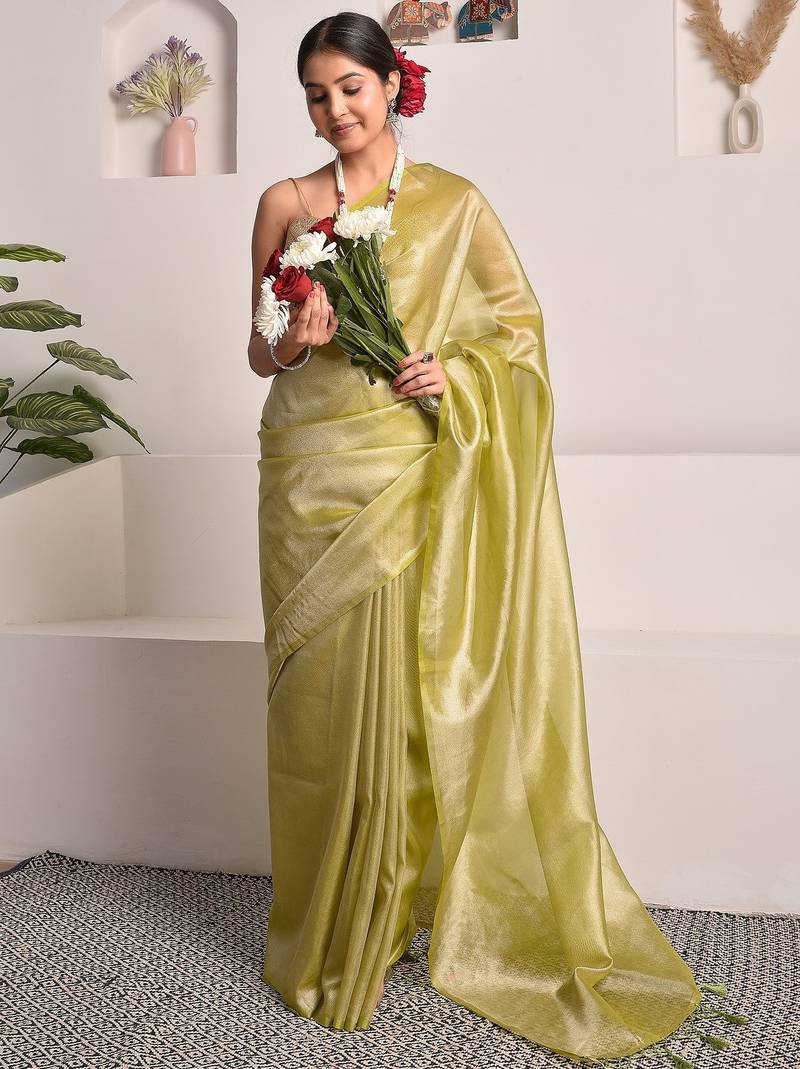 Chartreuse green tissue saree with unstitched blouse piece