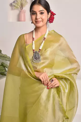 Chartreuse green tissue saree with unstitched blouse piece