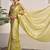 Chartreuse green tissue saree with unstitched blouse piece