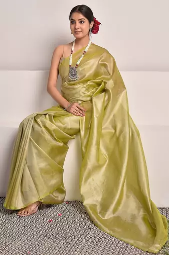 Chartreuse green tissue saree with unstitched blouse piece