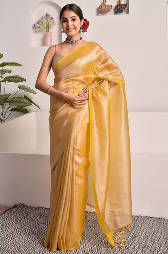 Mustard yellow tissue saree with unstitched blouse piece