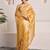 Mustard yellow tissue saree with unstitched blouse piece