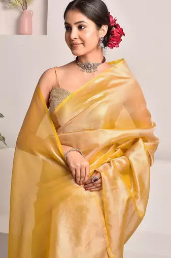 Mustard yellow tissue saree with unstitched blouse piece