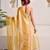 Mustard yellow tissue saree with unstitched blouse piece