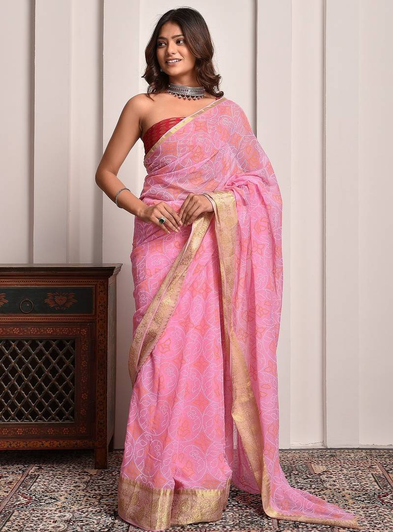 Pink bandhani print georgette saree with zari border