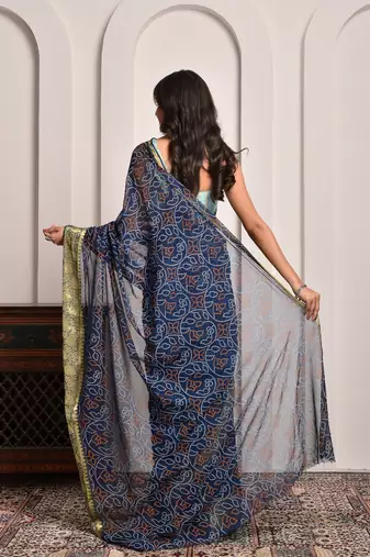 Navy blue georgette saree with bandhani print and zari border