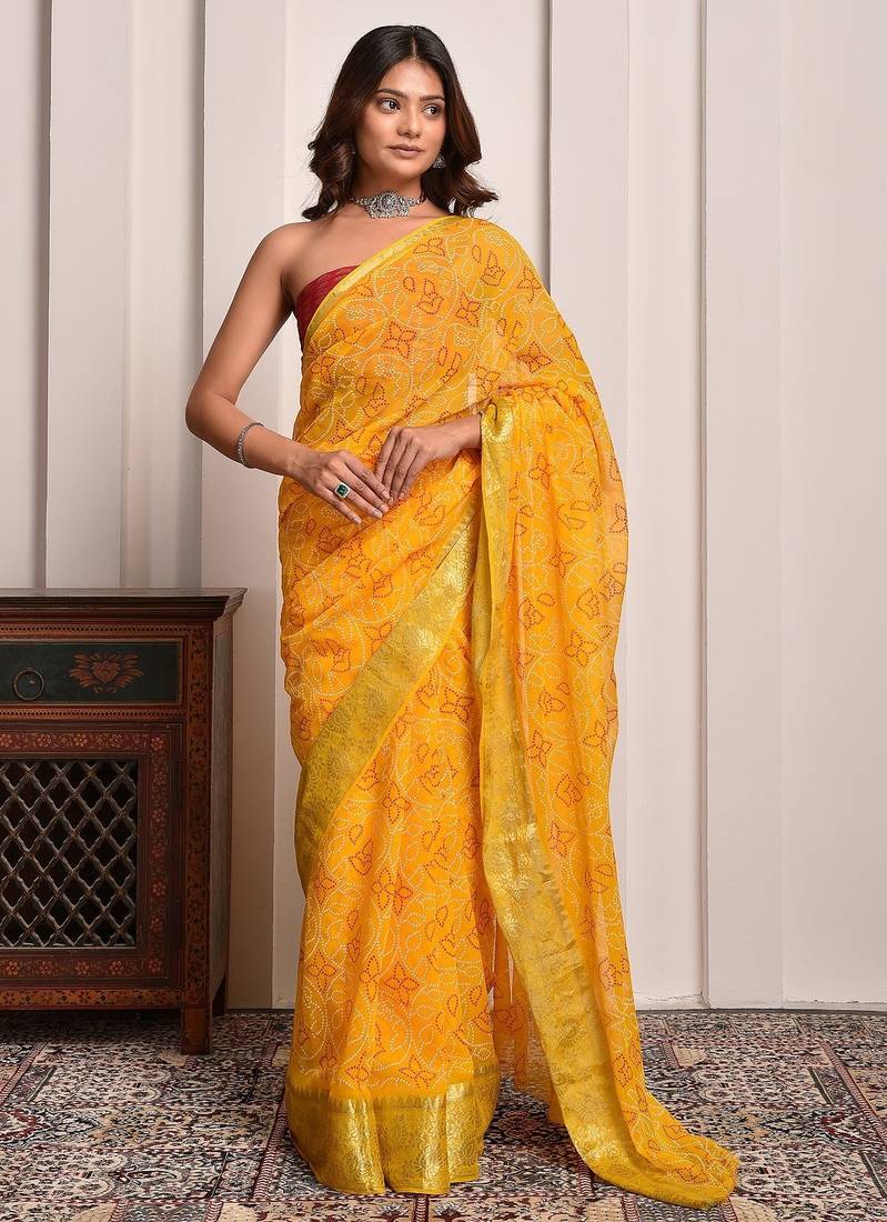 Yellow festive wear bandhani georgette saree