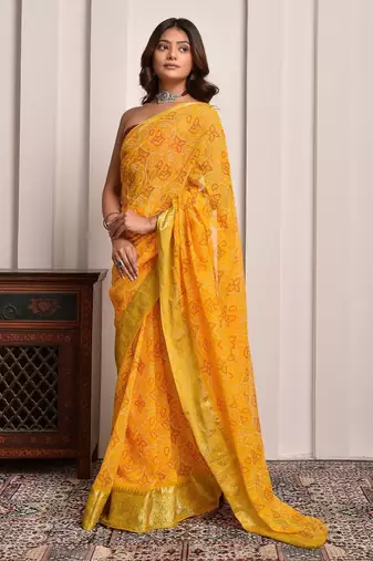 Yellow festive wear bandhani georgette saree