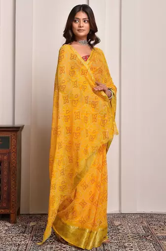 Yellow festive wear bandhani georgette saree