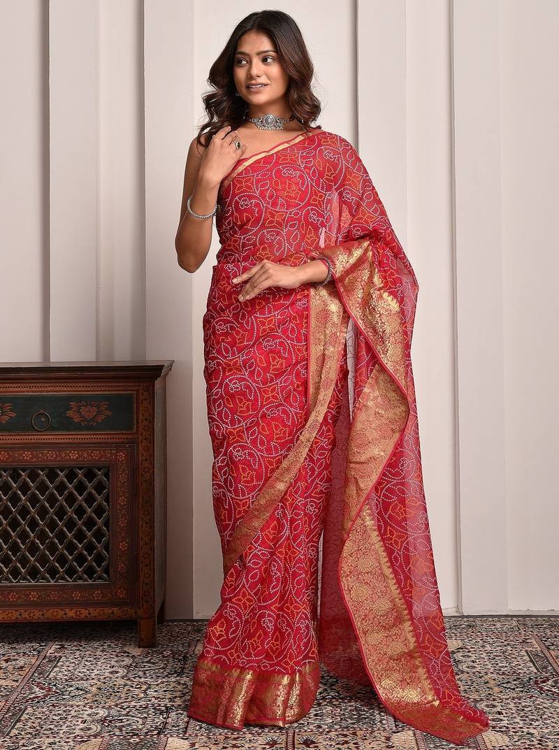 Magenta pink designer bandhani georgette saree with zari border