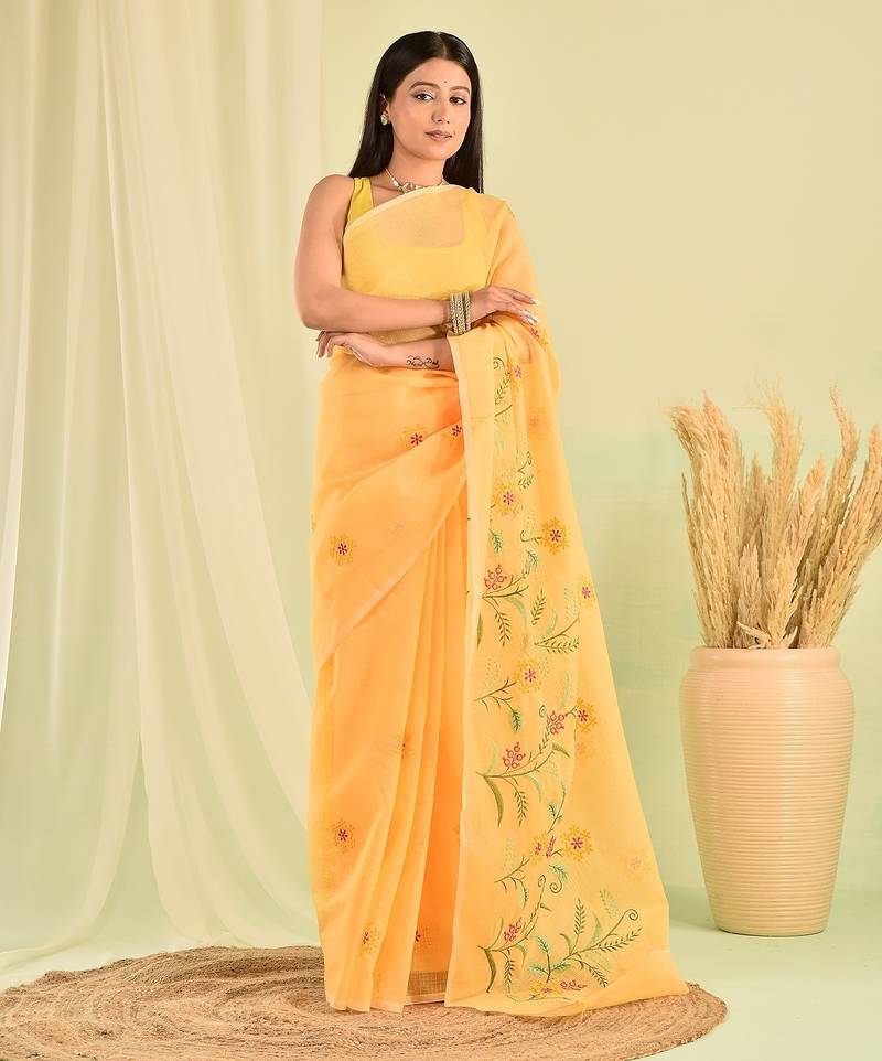 Yellow kota doria saree with hand embroidery