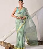 Green block printed pure kota doria floral  saree