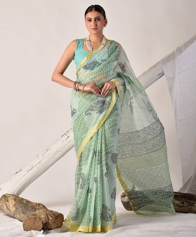 Green block printed pure kota doria floral  saree