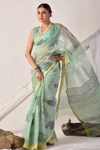 Green block printed pure kota doria floral  saree