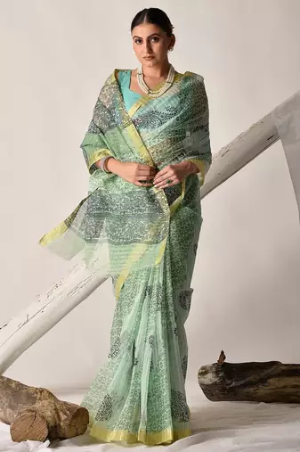 Green block printed pure kota doria floral  saree