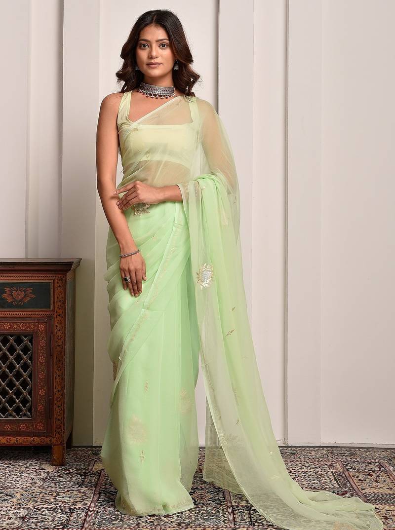 Pista green hand embellished chiffon saree
