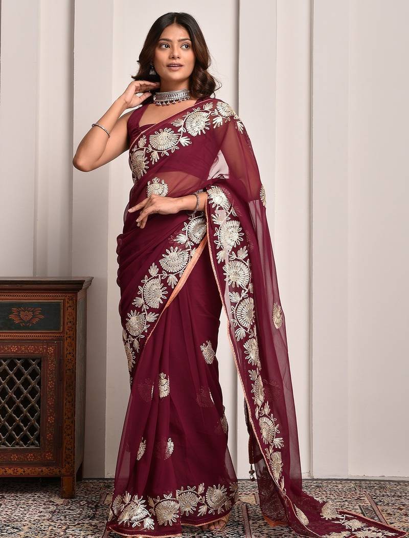 Luxe maroon gota accented georgette saree with unstitched blouse piece