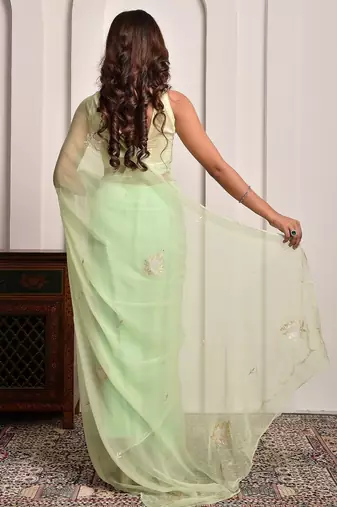 Pista green hand embellished chiffon saree