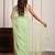 Pista green hand embellished chiffon saree