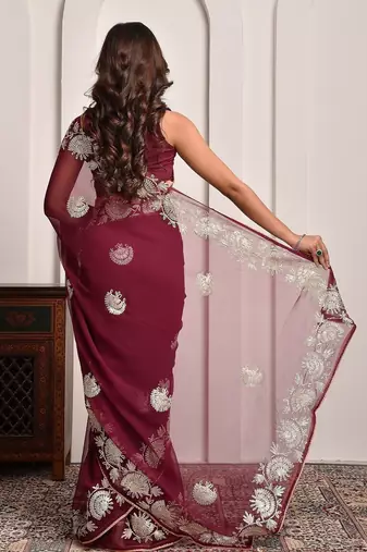 Luxe maroon gota accented georgette saree with unstitched blouse piece