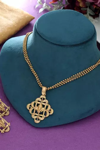 matte gold ganesha pendant necklace set with earrings
